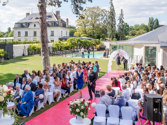 Le mariage de Julien et Sara à Le Coudray-Montceaux, Essonne 34