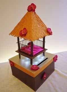 16. Une urne en forme de paillote