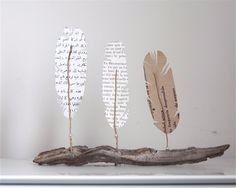 3. Le centre de table en plume de papier (Pourquoi ne pas y inscrire le menu ?)