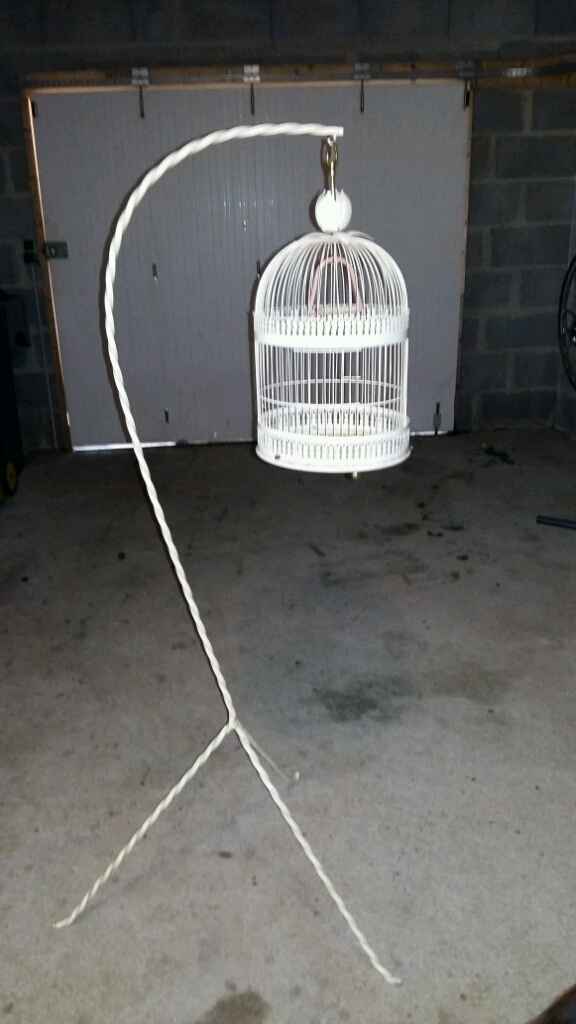 Cage a oiseau suspendu en guise de cagnotte - 1