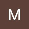 M C