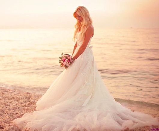 Robe longue et sable fin