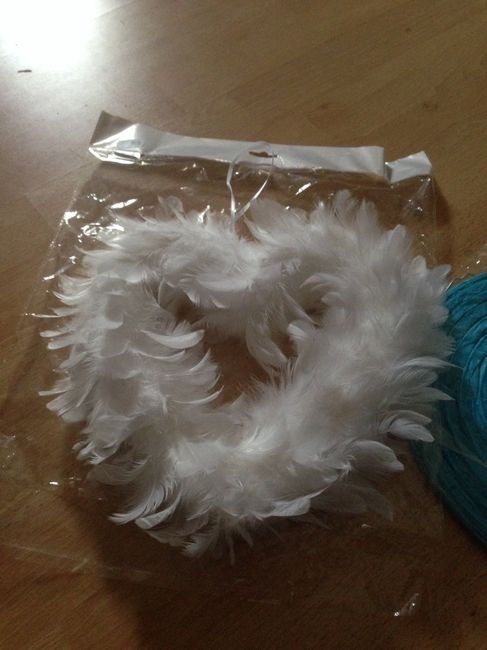 Cœur en plume blanc