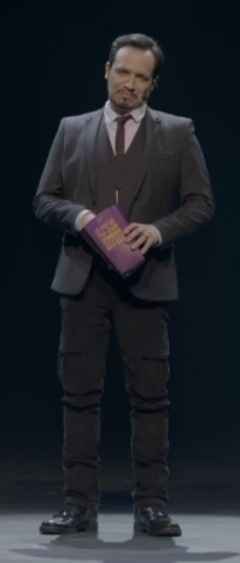 Le costume d'Alexandre Astier dans l'exoconférence 