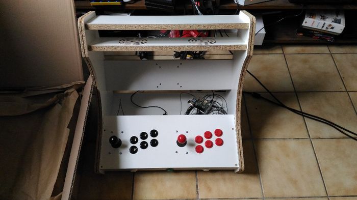 La borne d'arcade montée par monsieur