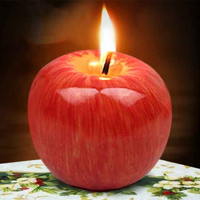 - Une bougie pomme
