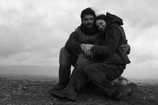 Photo de couple en tenue de travail