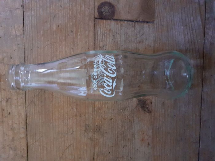 Comment effacer de la peinture sur des bouteilles en verre ? 1