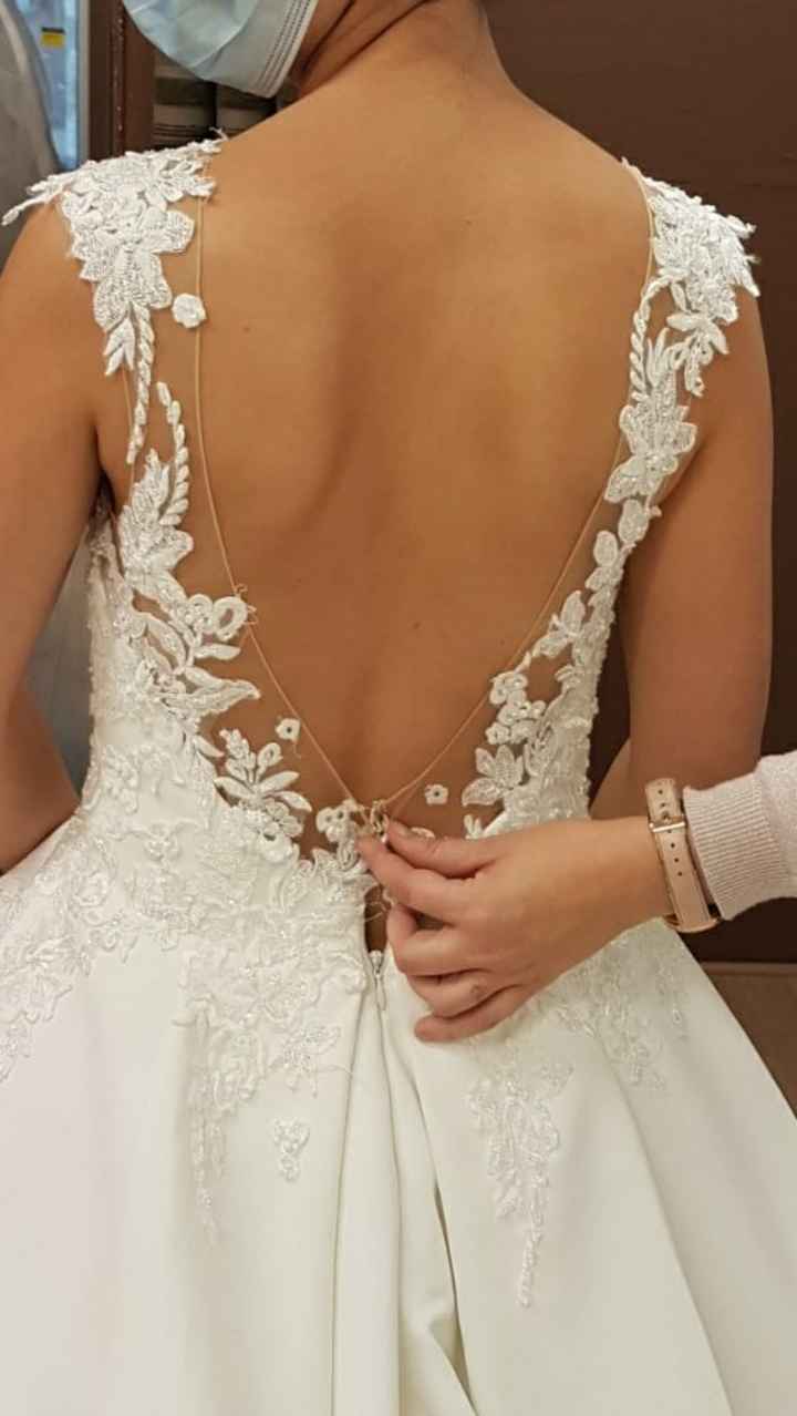 🏆 Ce dos de robe de mariée - 1