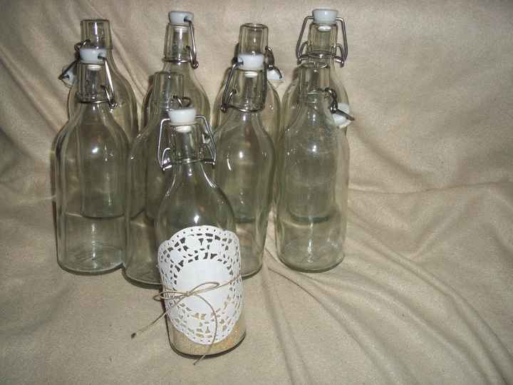 Lot de 9 bouteille de limonade à la base qui me servait de vase de centre de table