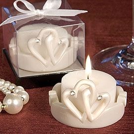 bougies photophores avec leurs coeur entrelacés nacrés