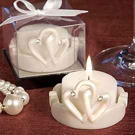 bougies photophores avec leurs coeur entrelacés nacrés