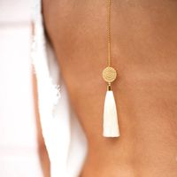 Bijoux de dos pompom agrandissement