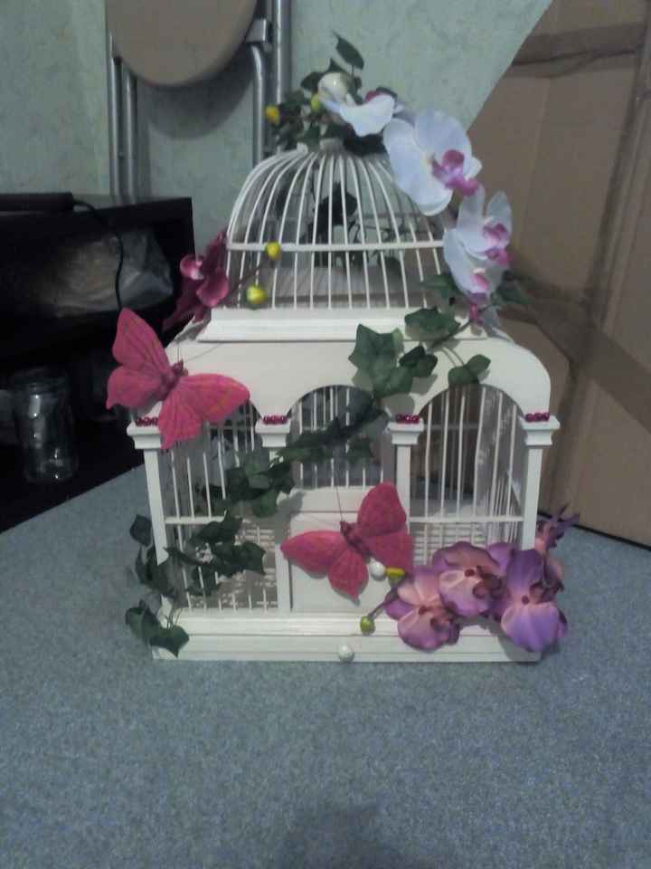 Urne cage à oiseau