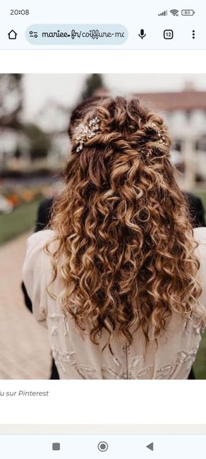 Coiffeur mariage cheveux frisés 11