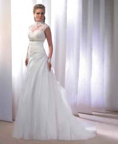 La robe de mariée du 19 mars 2013 est...