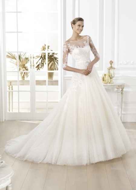 10 robes de mariée manches 3/4: votez pour votre préférée !