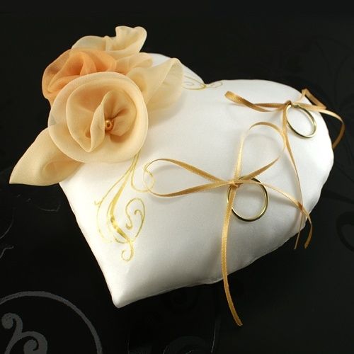 Coussin alliances or et blanc
