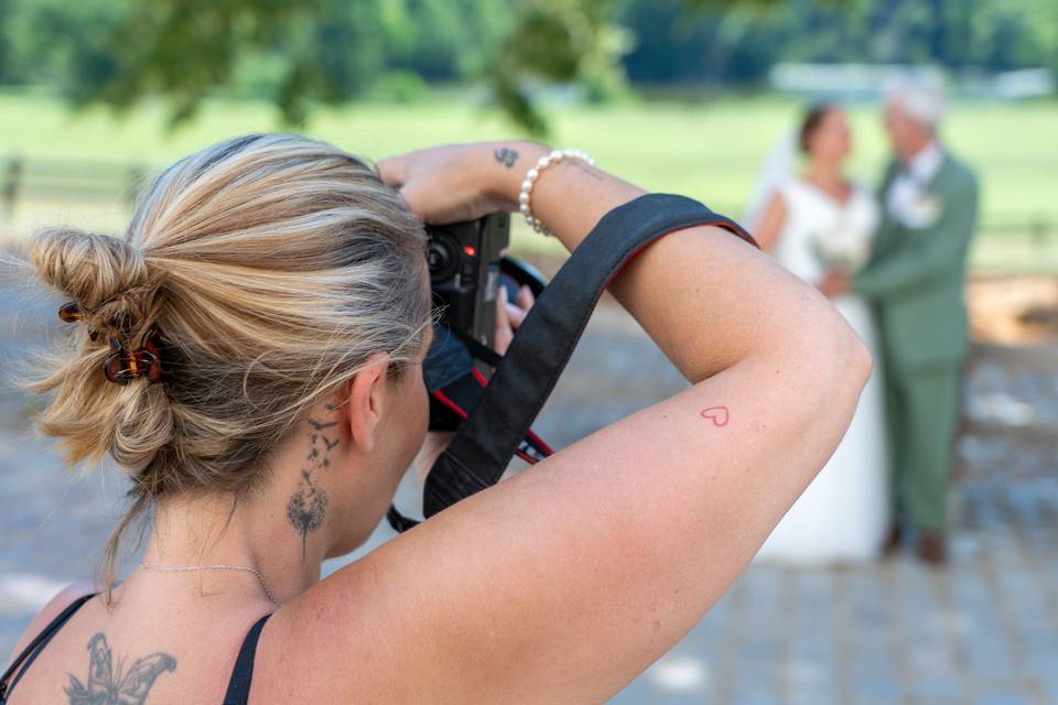 vue epaule photographe maries