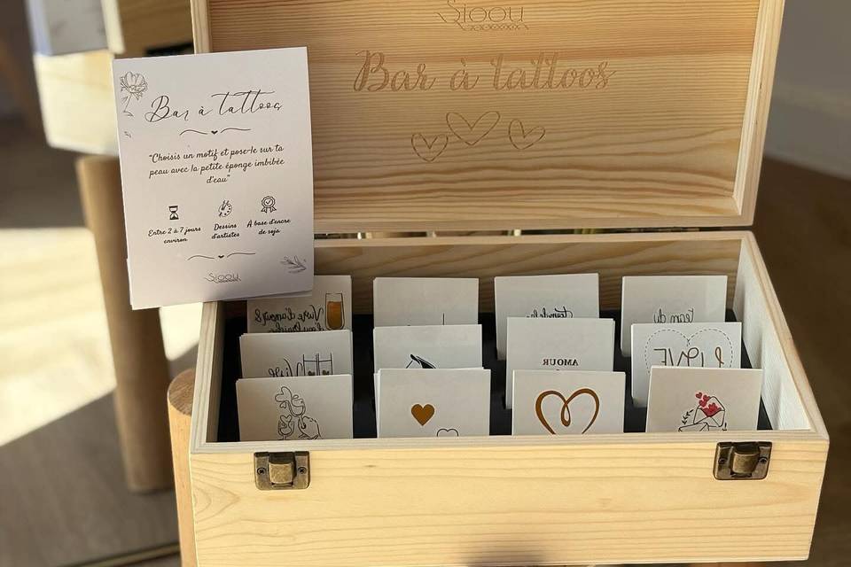 Boîte à tatouages à dispositio