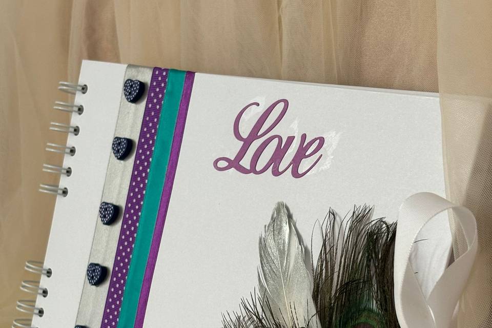 Livre d'or plume de paon