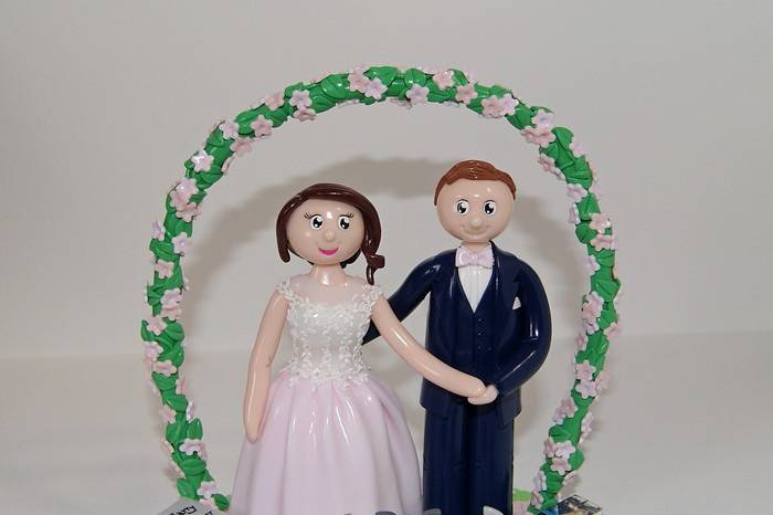 Figurines mariage sous arche