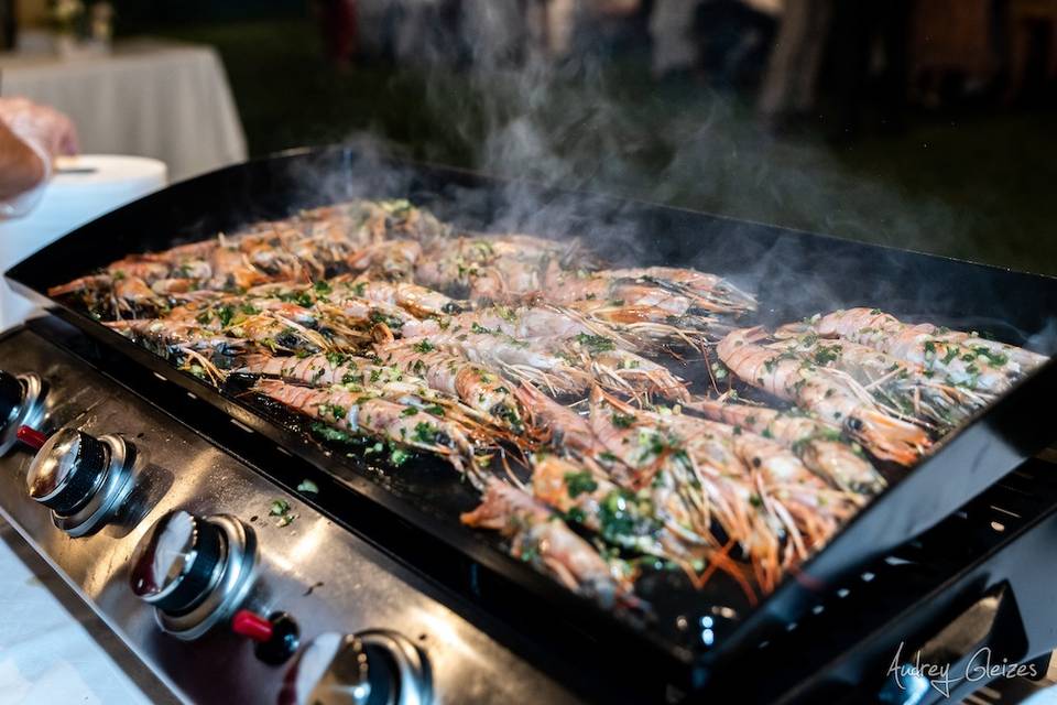 Plancha de gambas flambées