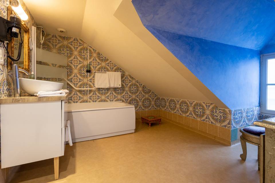 Salle de bain chambre deluxe