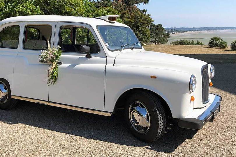 Notre taxi anglais blanc