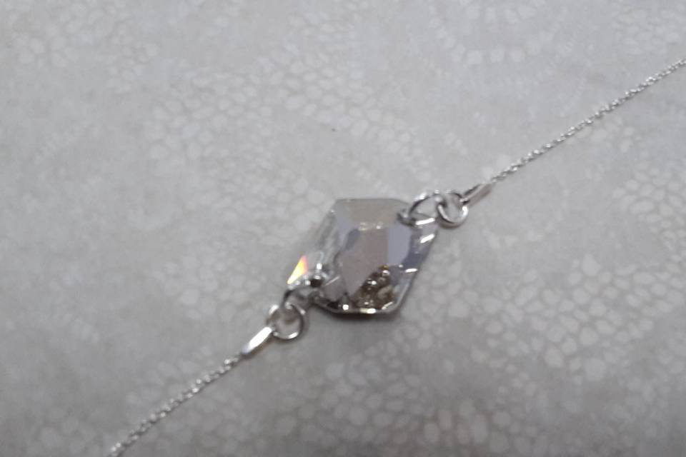 Collier de dos cristal emeraud