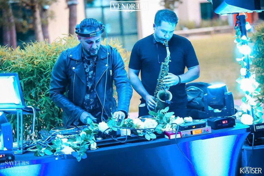 With Adrian Sax