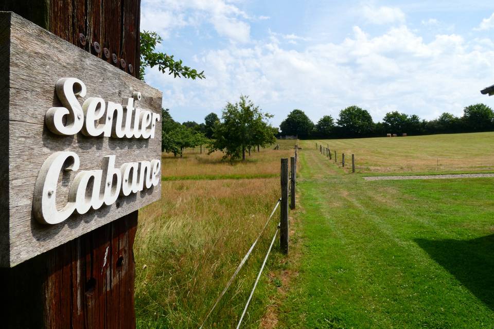 Sentier cabane en bois