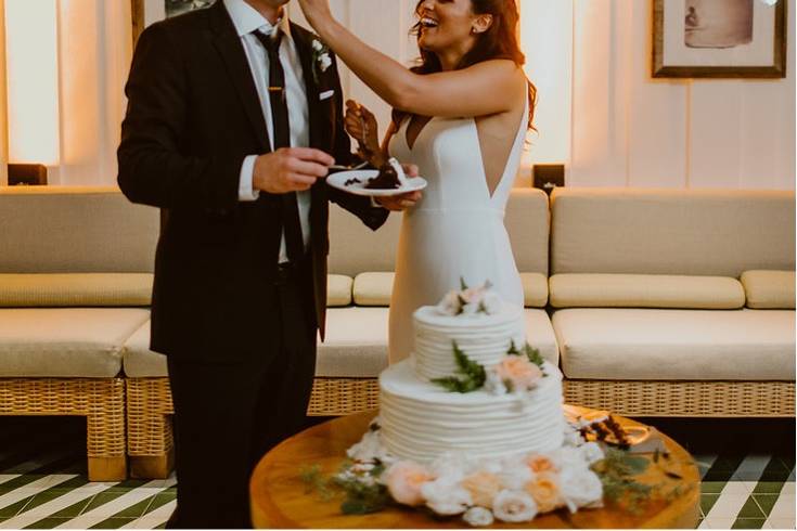 Bride & Groom Cutting Cake