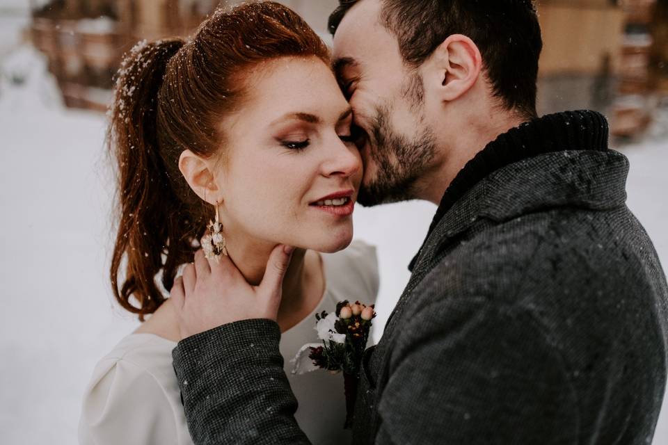 Séance couple à la neige