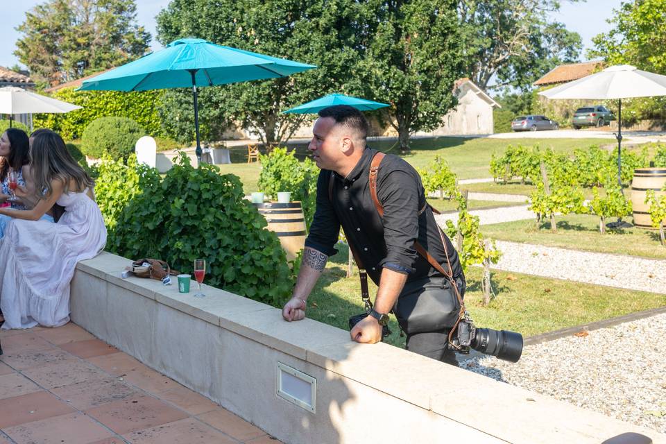 Photographe sur muret