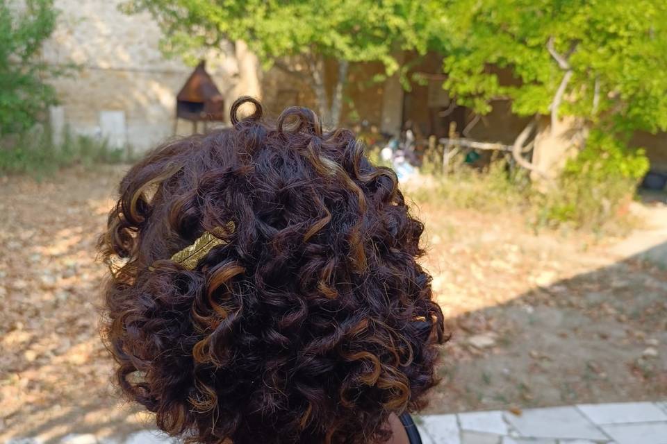 Coiffage cheveux bouclés