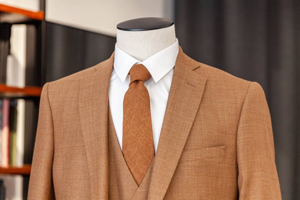 Detail_Gros plan sur costume en tweed marron