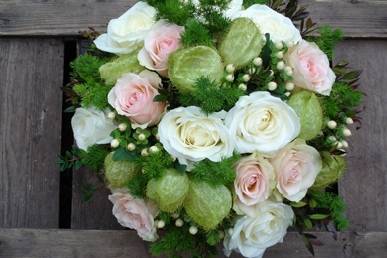 Centre de table roses et asclepias