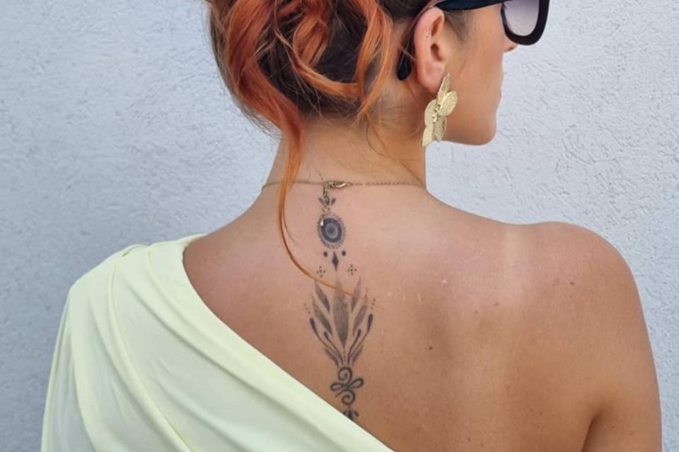 CHIGNON HAUT BOUCLE