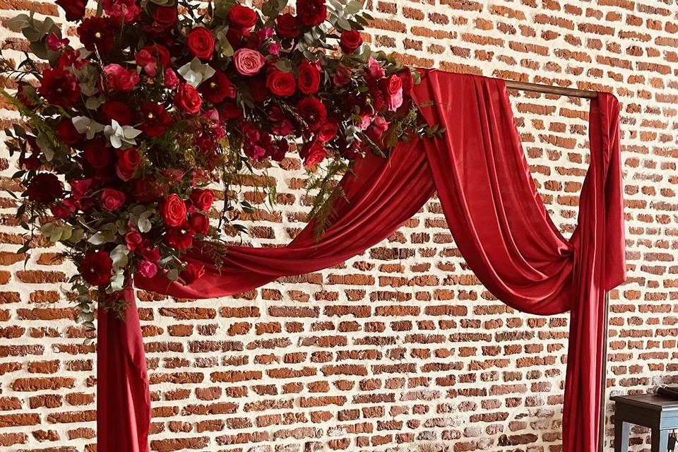 Arche cuivre floraison rouge