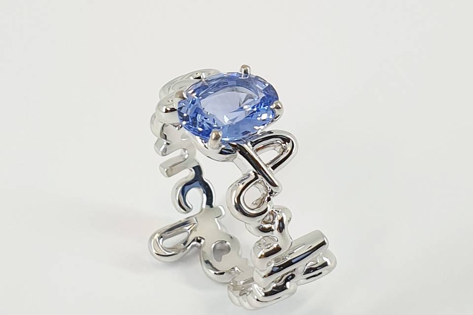 Bague cursive saphir