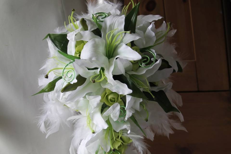 Bouquet mariage lys et plumes