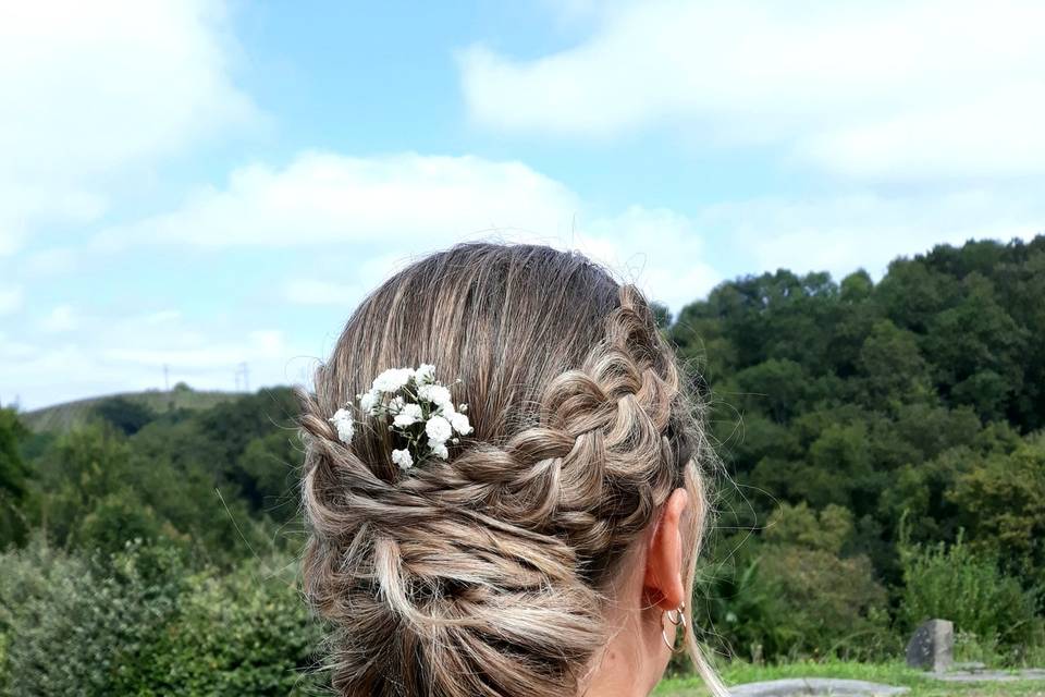 Chignon boule avec tresses