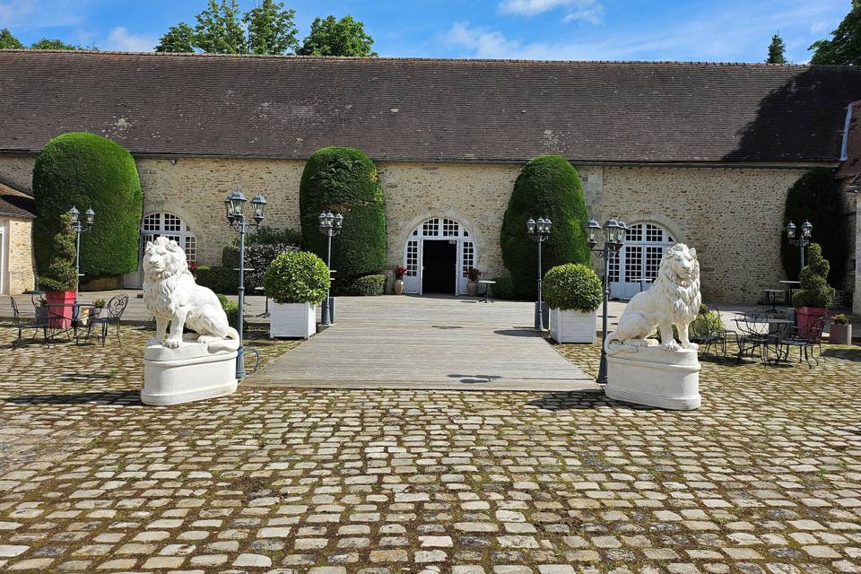 Cour pavée et terrasse bois