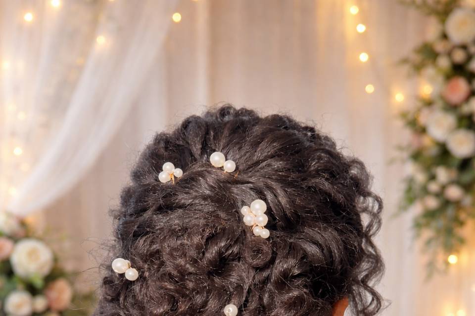 Chignon loose cheveux texturés