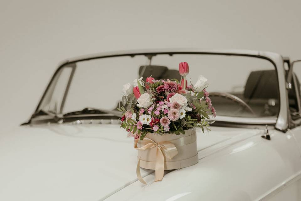 Old car and flowers