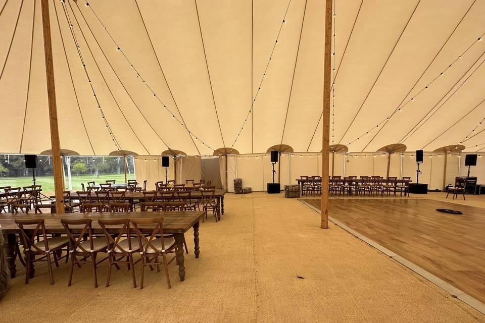 Wooden dance floor inside tent