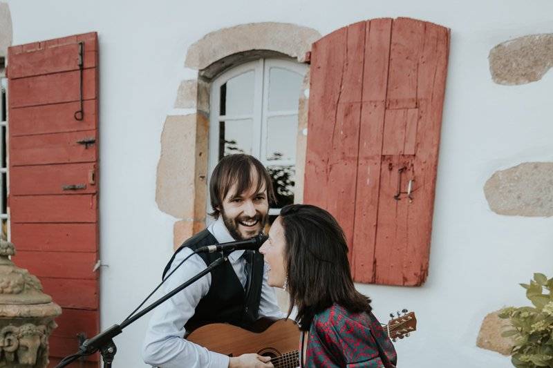 Wedding duet with a guest