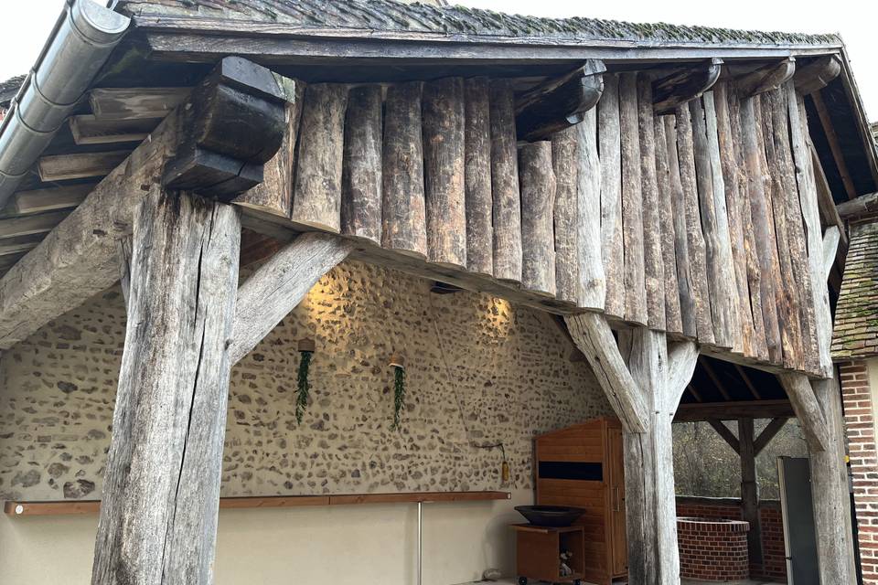 La terrasse sous pergola