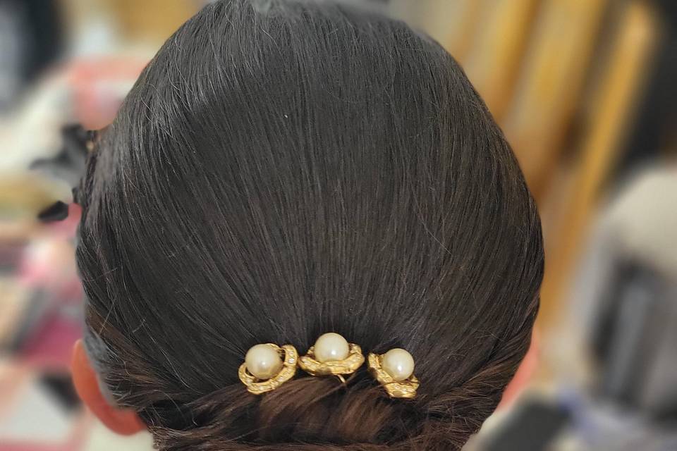 Chignon bas plaqué